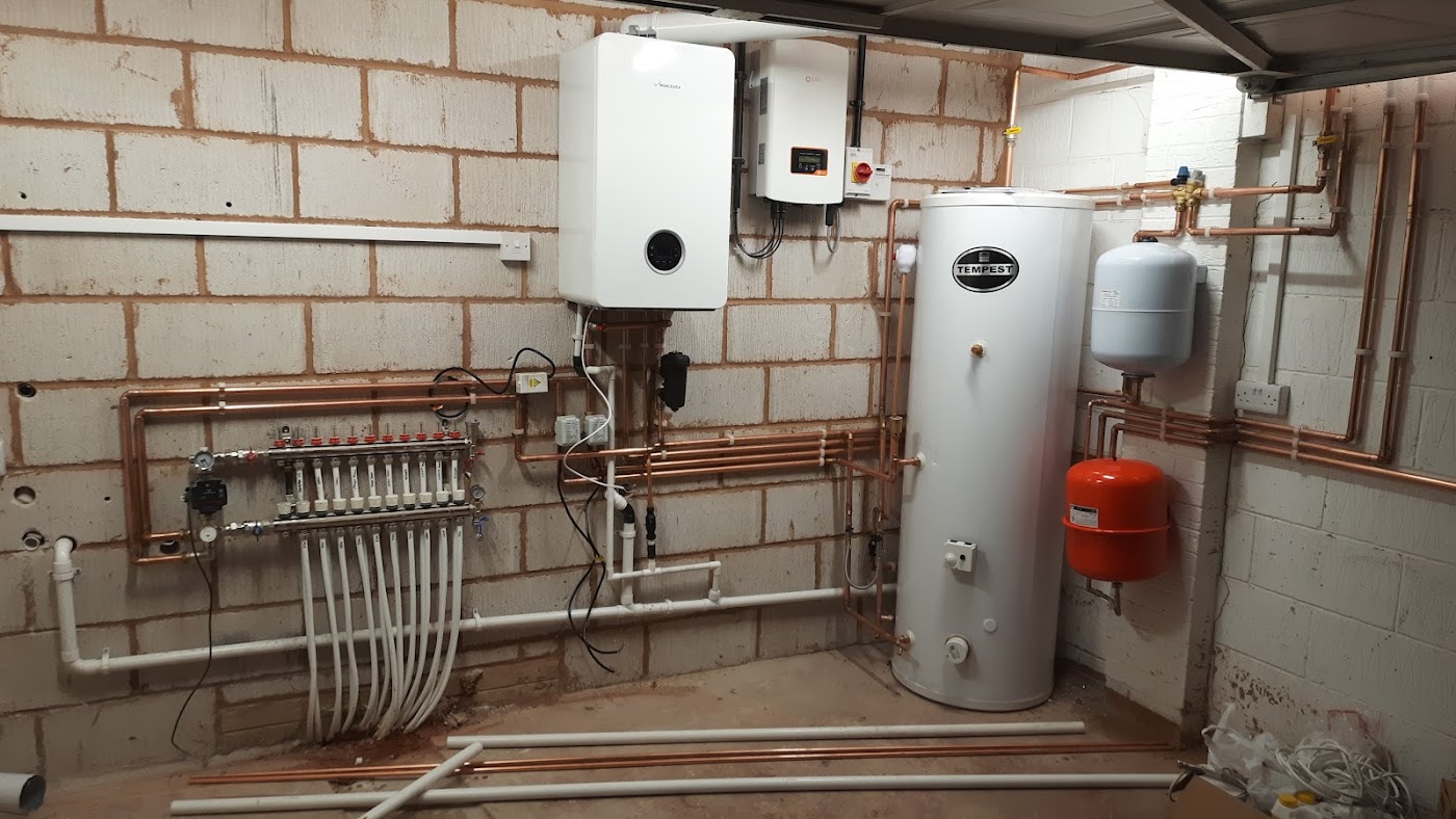 SAE gas and heating services — boiler, cylinder and manifold installation with tidy copper pipework